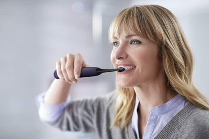 Philips Sonicare ProtectiveClean 6100 Rechargeable Electric Toothbrush, with Pressure Sensor, 3 Cleaning Modes, SmarTimer and QuadPacer, 14-Day Battery Life, Travel Case, Deep Purple, Model HX6471/03