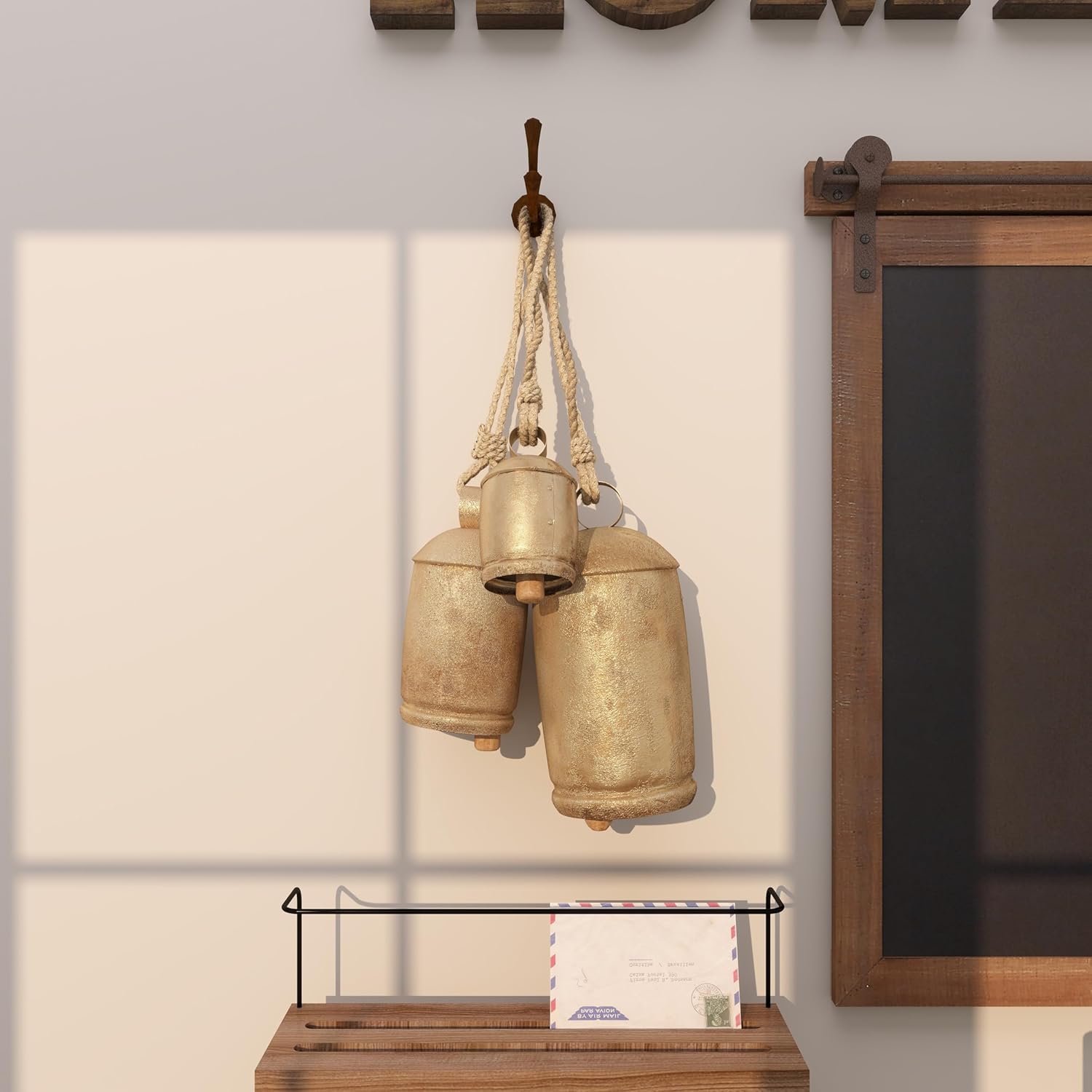 Deco 79 Gold Metal Tibetan Inspired Decorative Giant XL Cow Bells with Jute Hanging Rope, Set of 3 10",8",6"H - Cylindrical